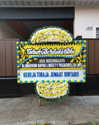 Papan Bunga Duka di Malendeng